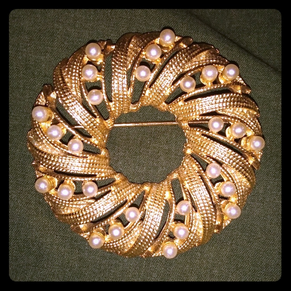 Pair of brooches
